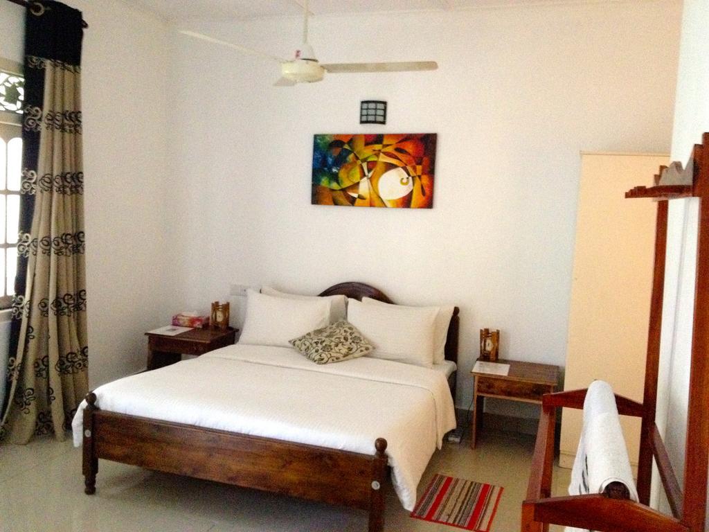 Fire Dragon Hideaway Negombo Quarto foto