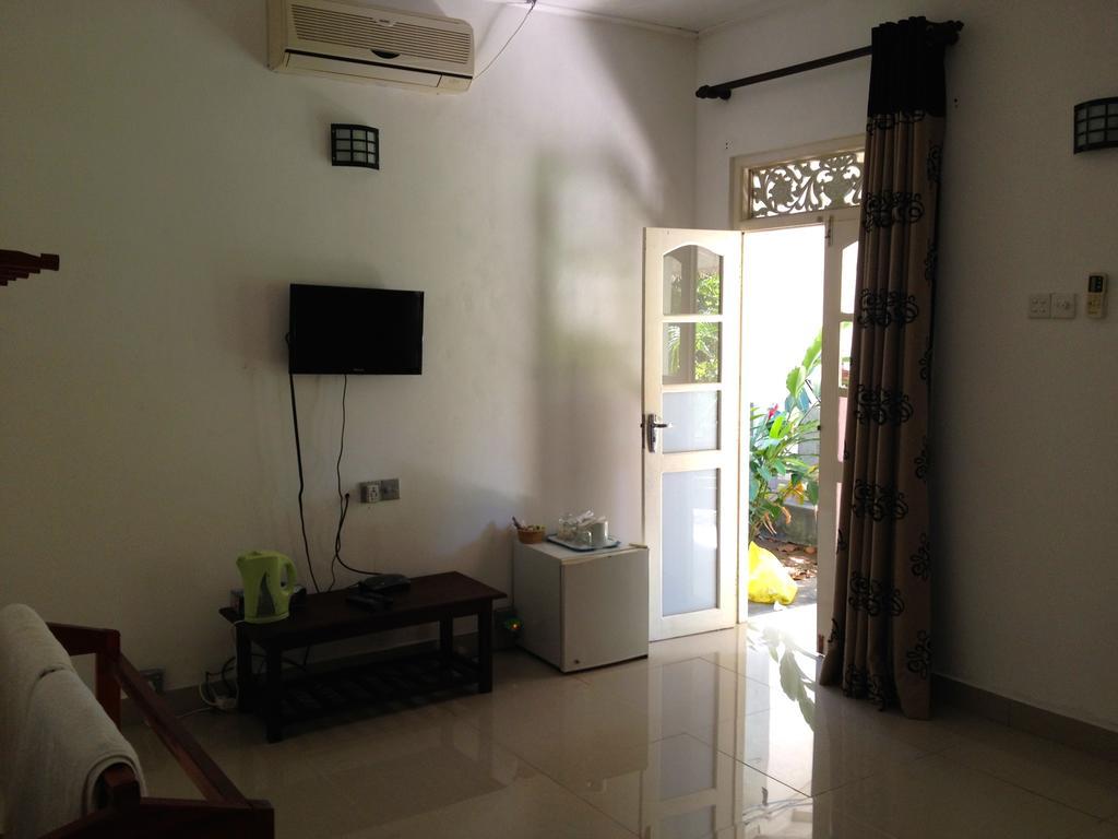 Fire Dragon Hideaway Negombo Quarto foto
